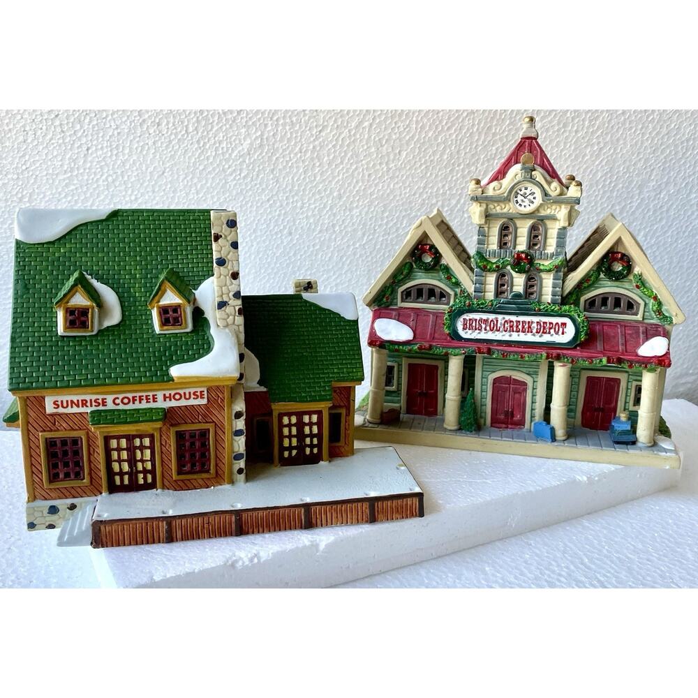 Lemax Christmas village porcelain buildings include the 2 Pc Sunrise Coffee Hous